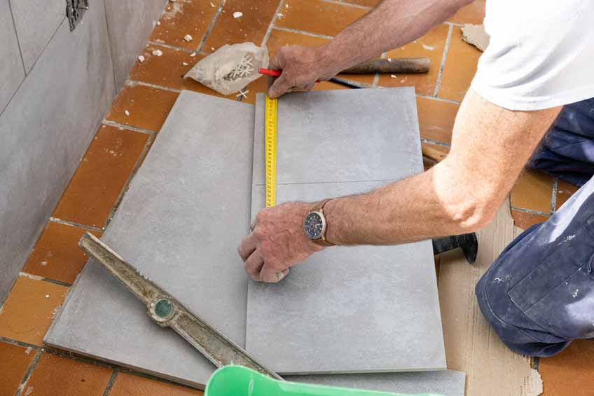 Handyman tiling over tiles